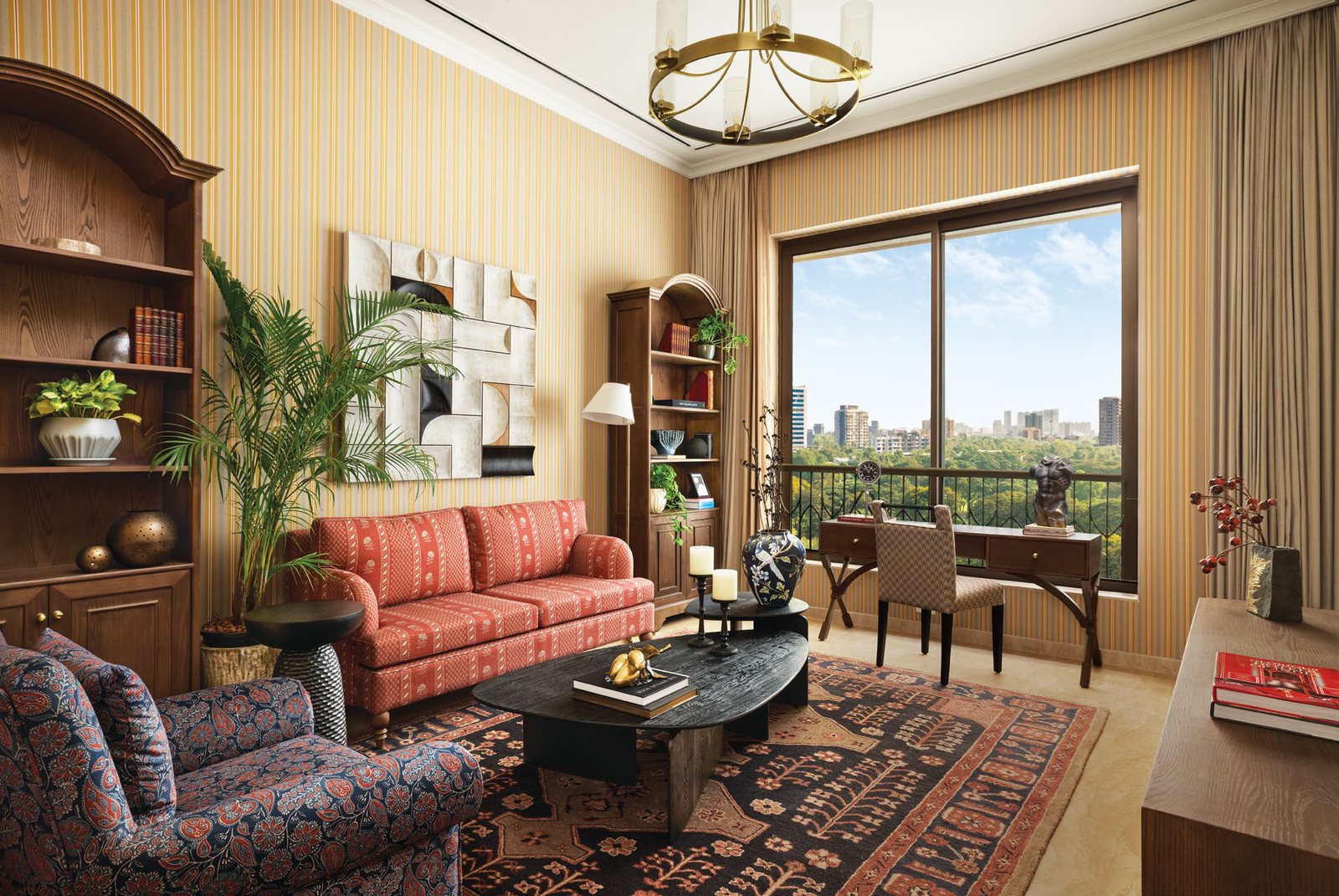 Maitri Park 2 BHK living room with study and city view